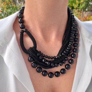 Handmade Multi-strand Onyx statement necklace and gold plated elements