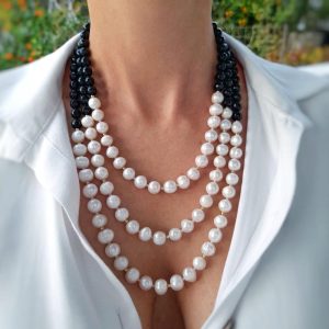 Handmade Multi-strand Onyx statement necklace combined with fresh water pearls and gold plated elements