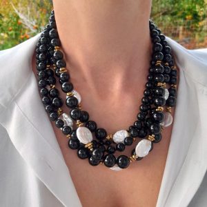 Handmade Multi-strand Onyx statement necklace combined with baroque pearls and gold plated elements