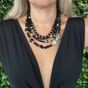 Handmade Multi-strand Onyx statement necklace and gold plated elements