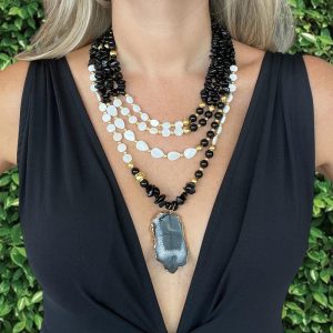 Handmade Multi-strand Onyx statement necklace combines with mother of pearl and gold plated elements
